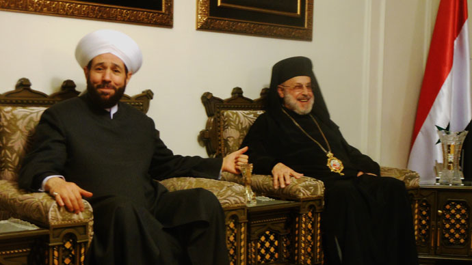 Syria's Grand Mufti Ahmad Badr Al-Din Hassoun and Syrian Greek Orthodox Bishop Luca al-Khoury .jpg