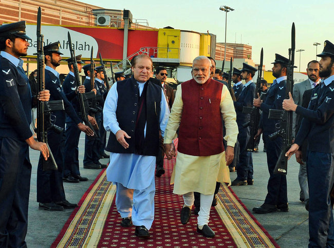 Indian Prime Minister Narendra Modi was welcomed by the Prime Minister of Pakistan, Nawaz Sharif, at the airport in Lahore on Friday.jpg