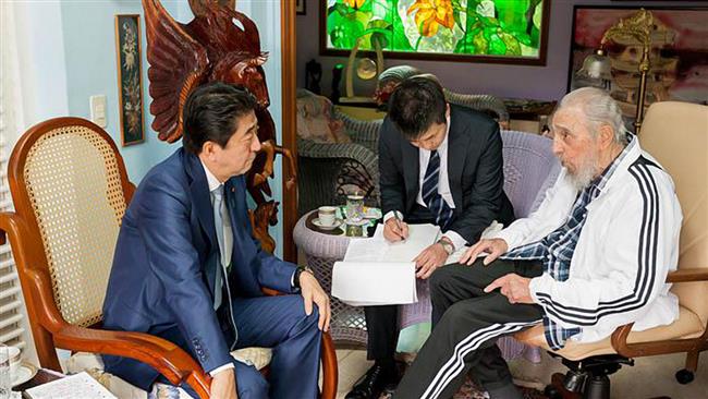 Cuba’s revolutionary leader Fidel Castro (R) is seen during a meeting with Japanese Prime Minister Shinzo Abe (L), in Havana, September 22, 2016.jpg