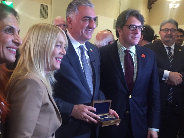 Reza Pahlavi (middle) receiving key to the city from current Beverly Hills Mayor John Mirisch (right) and former mayor Lili Bosse (left).jpg